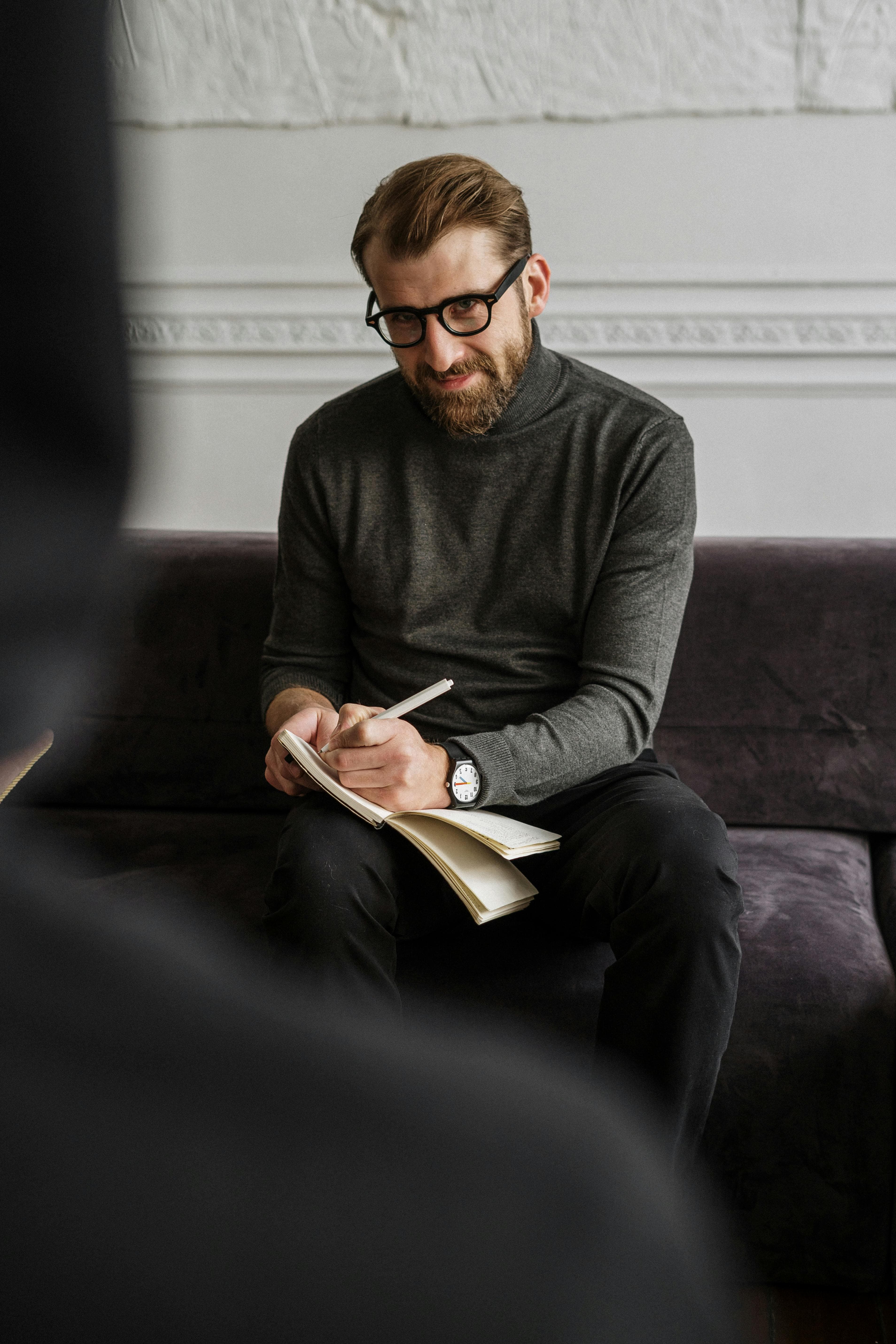Man Taking notes